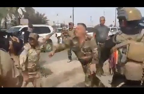 القوات العراقية تعتقل شخص يسرق المحلات تكريت