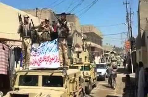 احتفالات اهالي بهرز مع القوات الامنية والحشد الشعبي